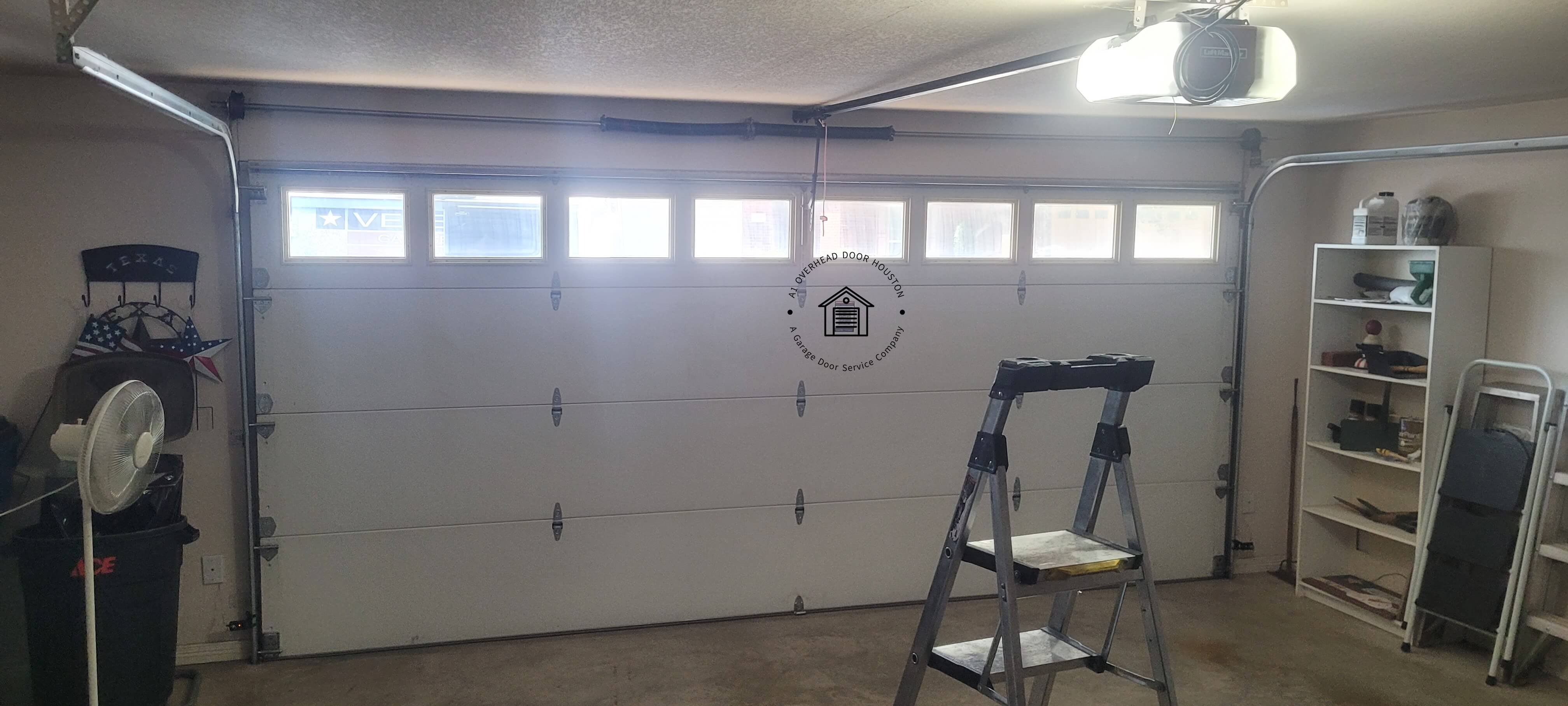 a1overheaddoorhouston.com_garage_door_spring_replacement