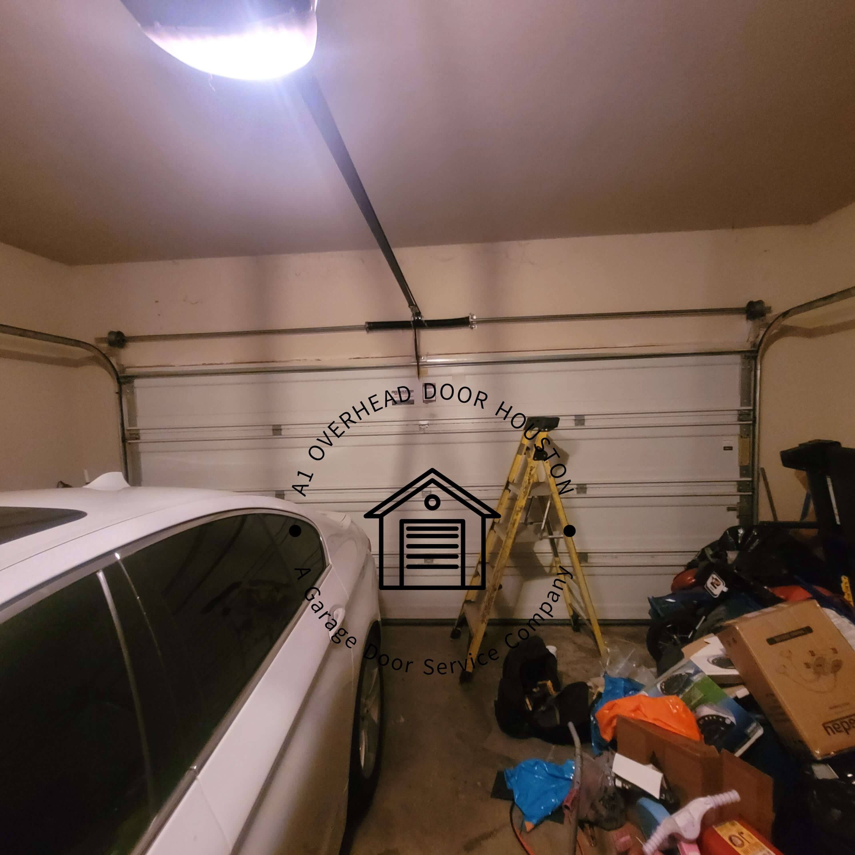 a1overheaddoorhouston.com_wayne_dalton_garage_door_spring_conversion